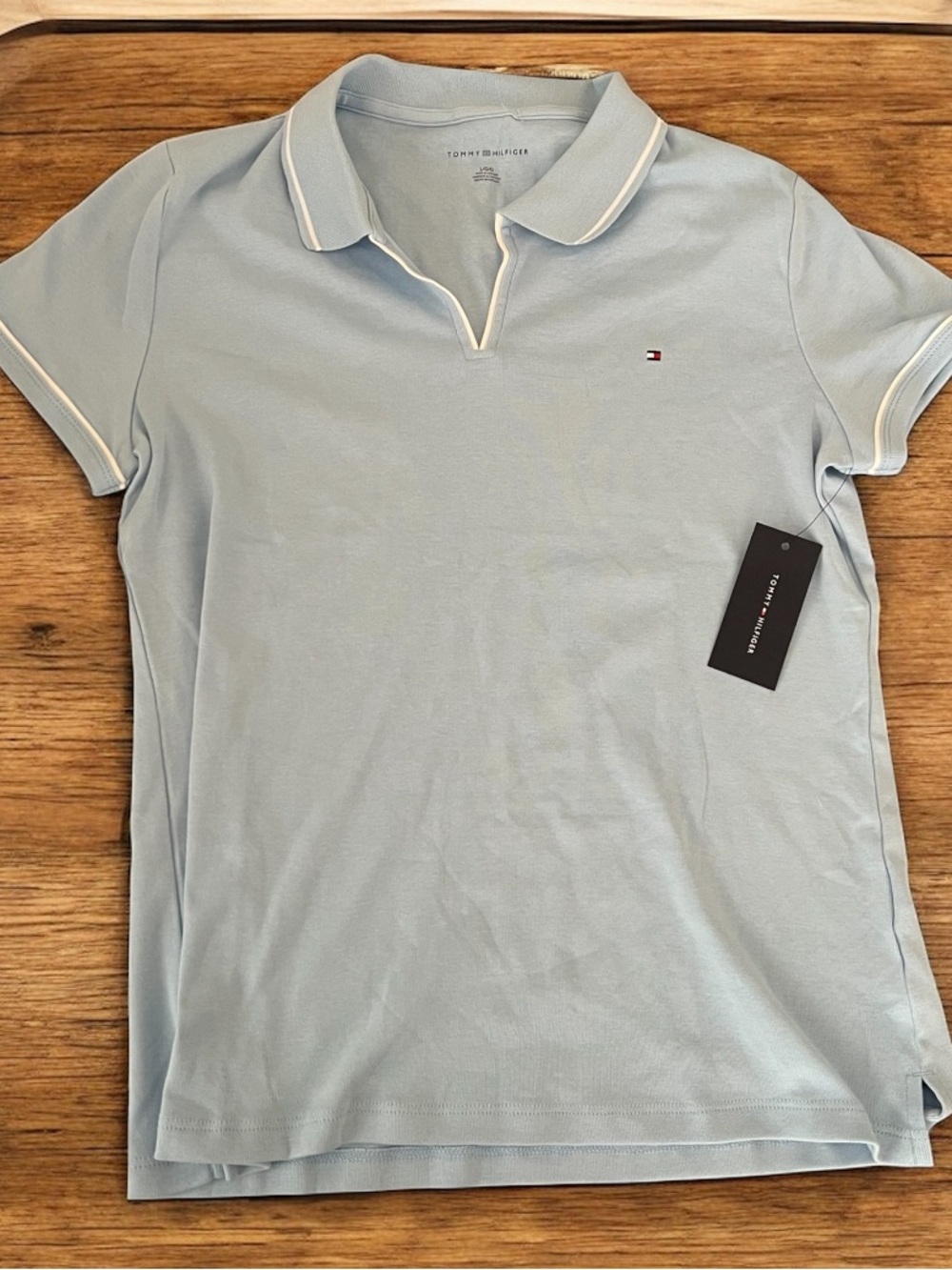 Tommy Hilfiger Women’s large Pale Blue Polo with White Piping